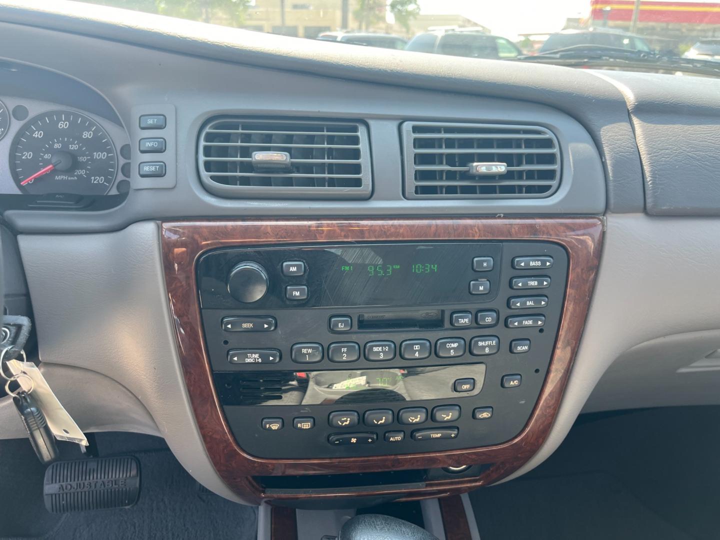 2004 white /TAN Mercury Sable LS Premium (1MEHM55S54A) with an 3.0L V6 SOHC 24V engine, 4-Speed Automatic Overdrive transmission, located at 14700 Tomball Parkway 249, Houston, TX, 77086, (281) 444-2200, 29.928619, -95.504074 - Photo#13